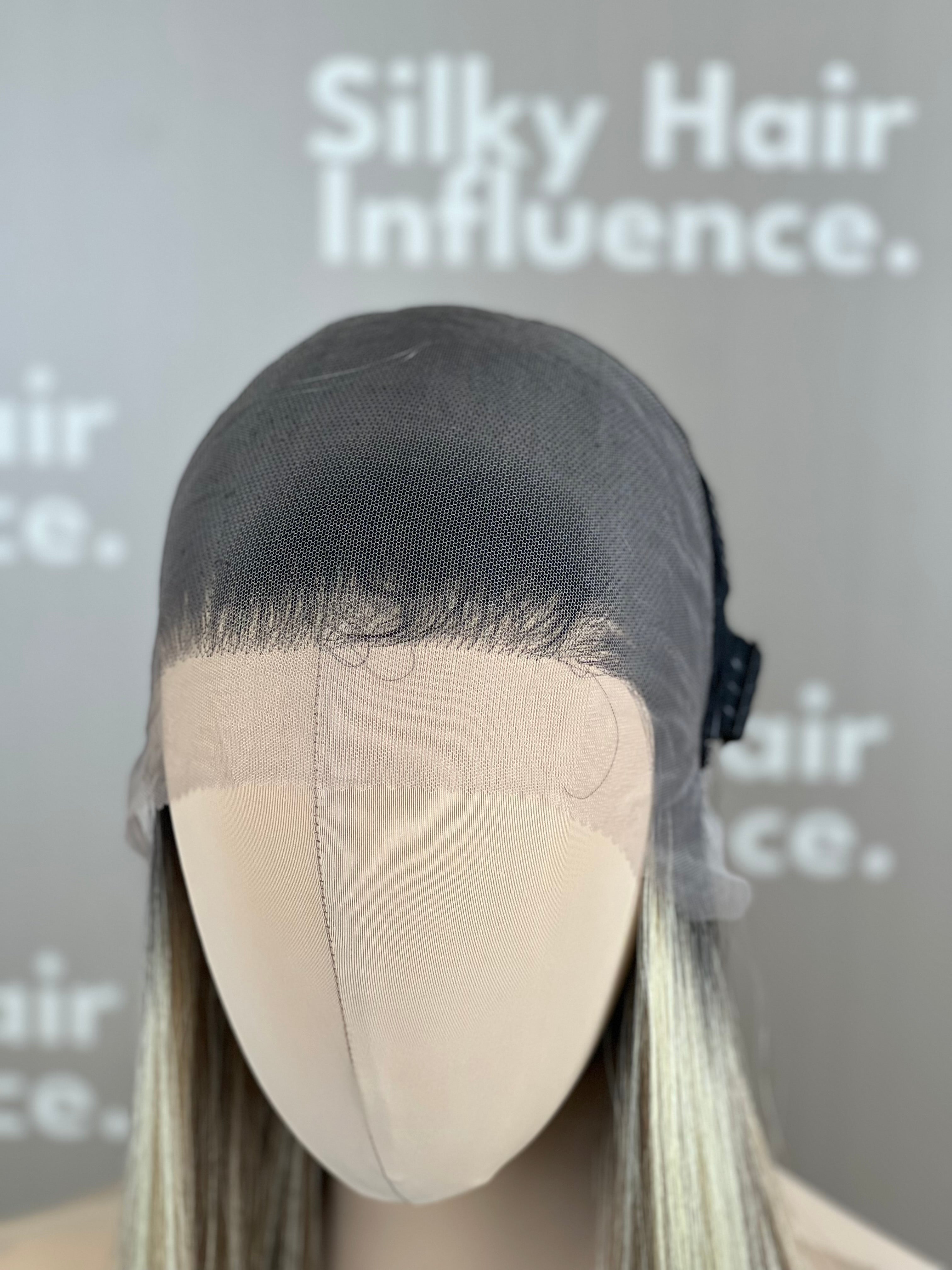 Finest Synthetic Wig 100 Highlighted Golden Bronde