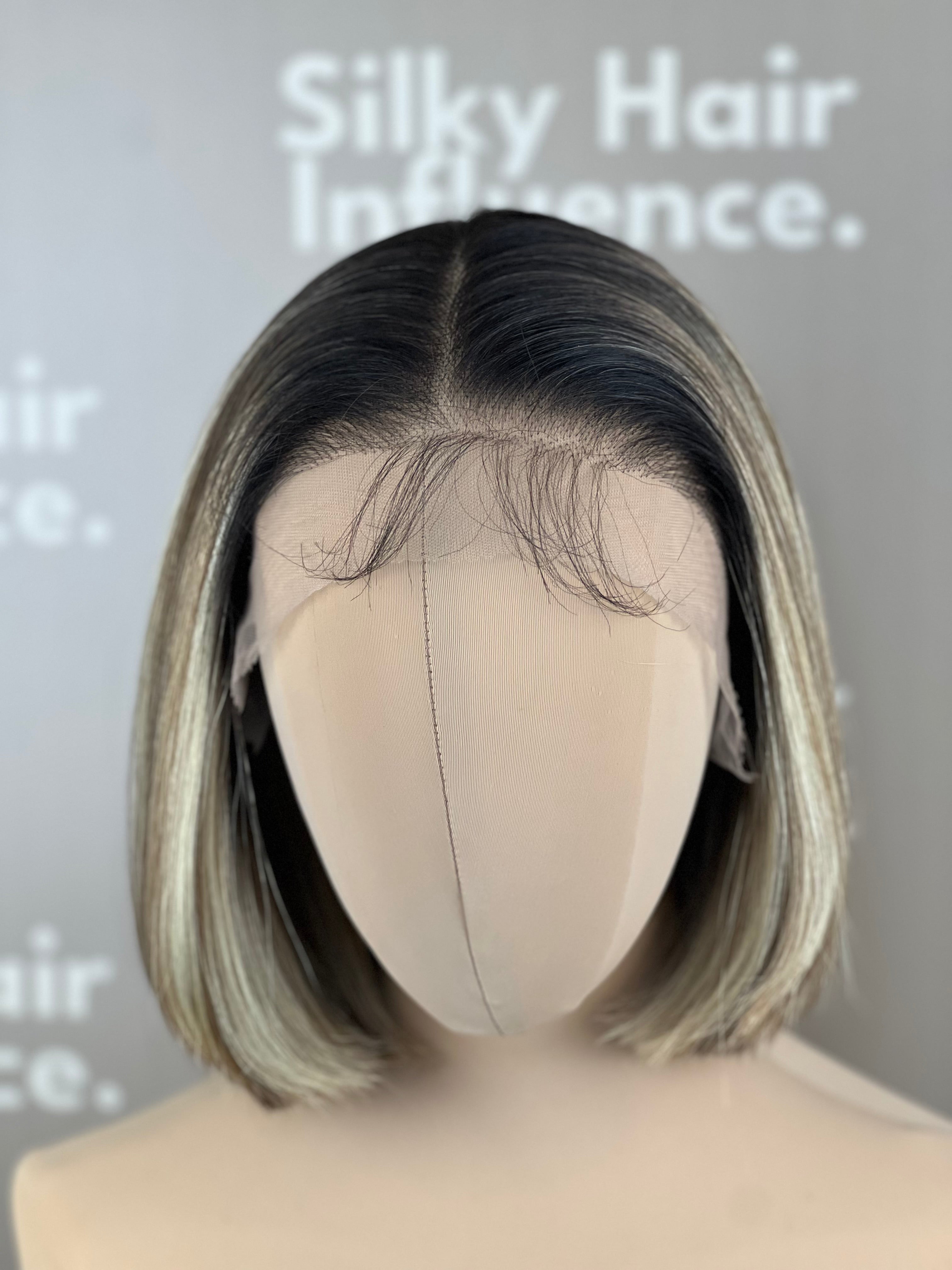 Finest Synthetic Wig 110 Highlighted Golden Bronde