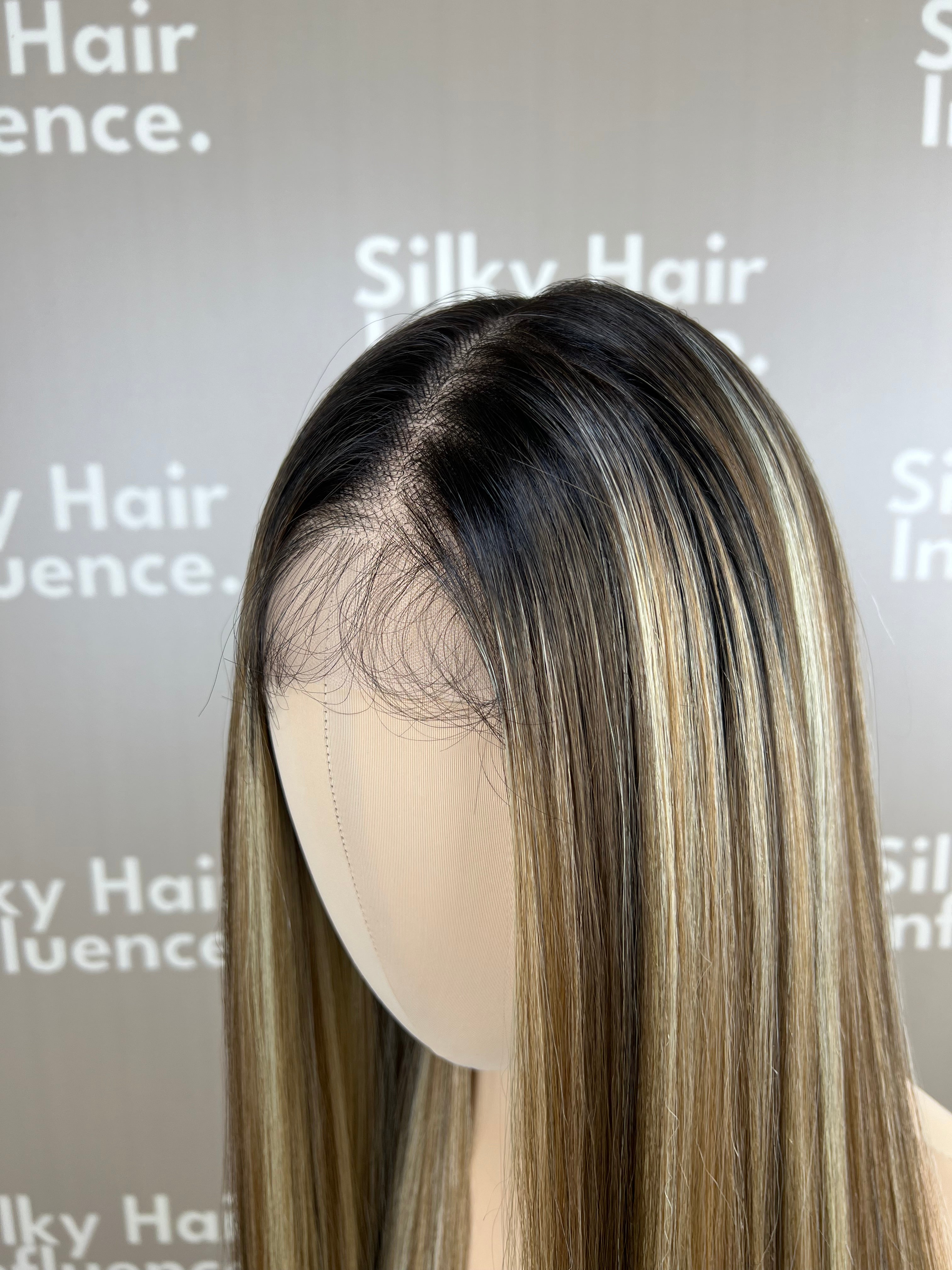 Finest Synthetic Wig 100 Highlighted Golden Bronde