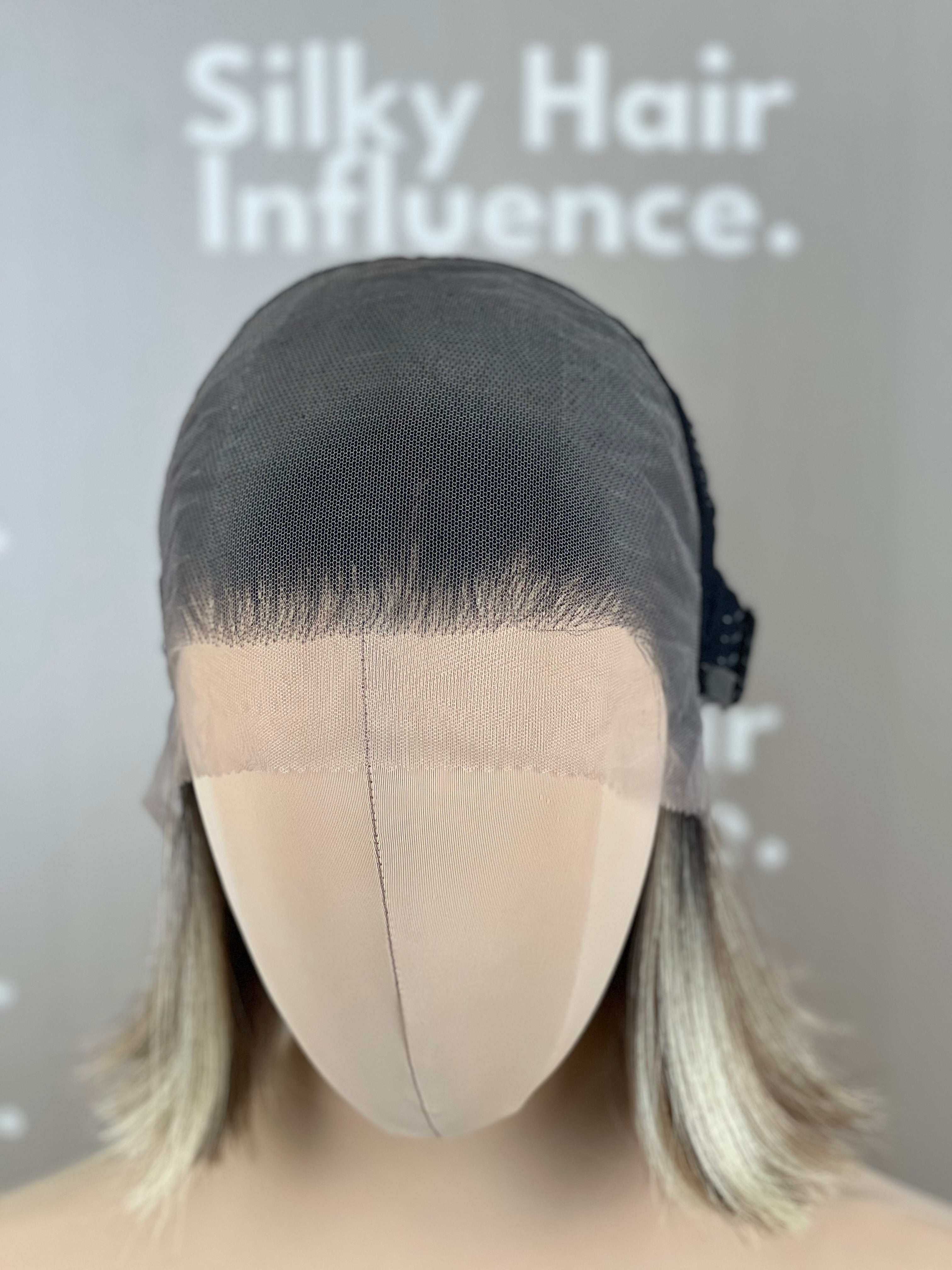 Finest Synthetic Wig 110 Highlighted Golden Bronde